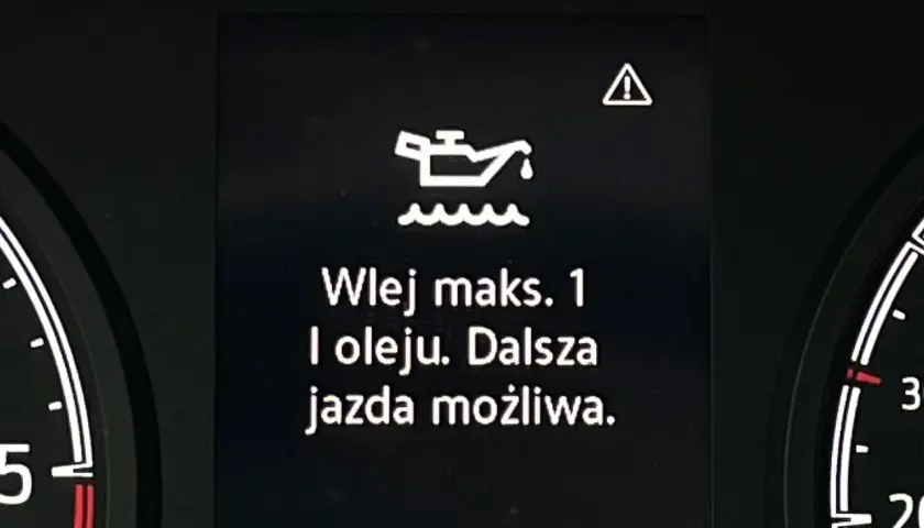 Żółta kontrolka oleju z falą: Co oznacza? Działaj, zanim zatrzesz!
